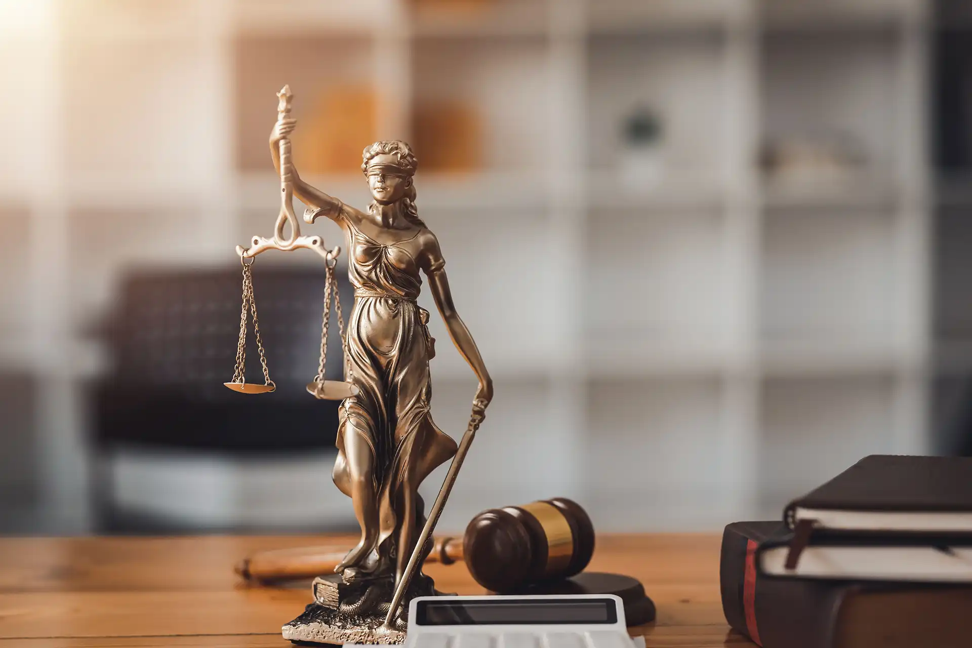 statue-of-lady-justice-on-desk-of-a-judge-or-lawye-2026-01-08-06-55-01-utc 1